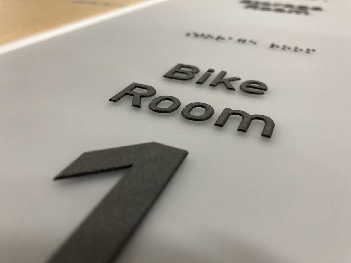Tactile and Braille Sign